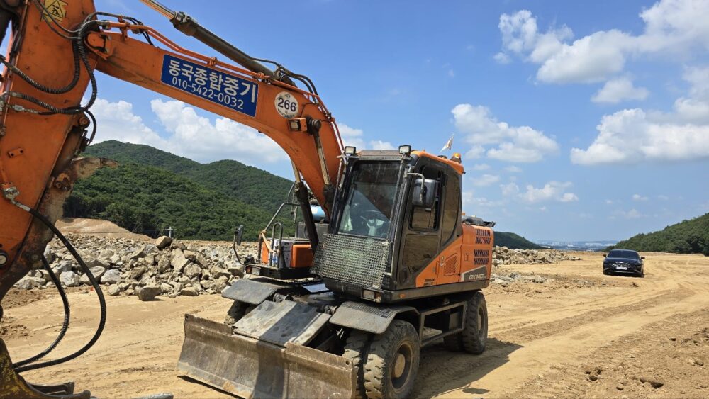 Doosan DX140W-5 (2015)